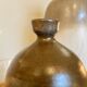Enamelled ceramic bottle