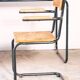 Desk with bauhaus style tubular steel chair