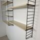 Vintage Nisse Strinning wall rack with 7 off-white shelves