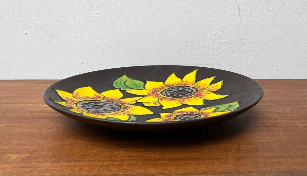 Mid-century German studio pottery wall plate with Ruscha sunflower motif, 1960s.