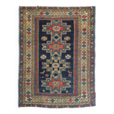 Antique tissé à la main - Tapis persan à fond bleu avec des figures ressemblant à des oiseaux