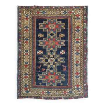 Handwoven Antique - Blue Ground Persian Rug with Bird-like Figures
