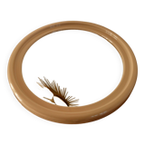 Large round mirror in pink beige plastic from the 70s