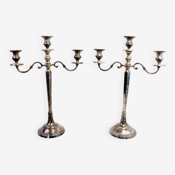 Pair of silver metal candlesticks