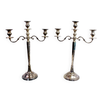 Pair of silver metal candlesticks