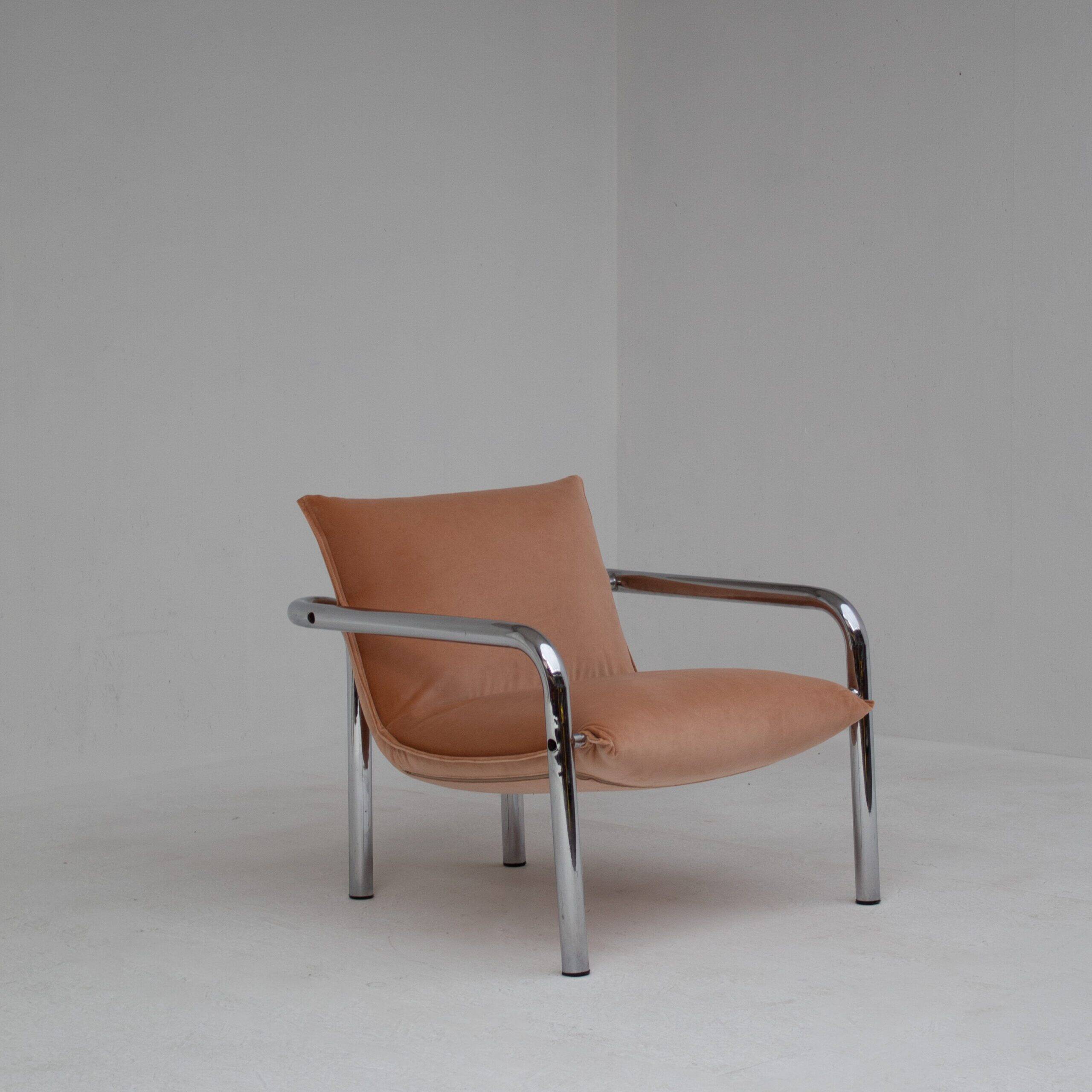 Pair of tubular armchairs in salmon velvet