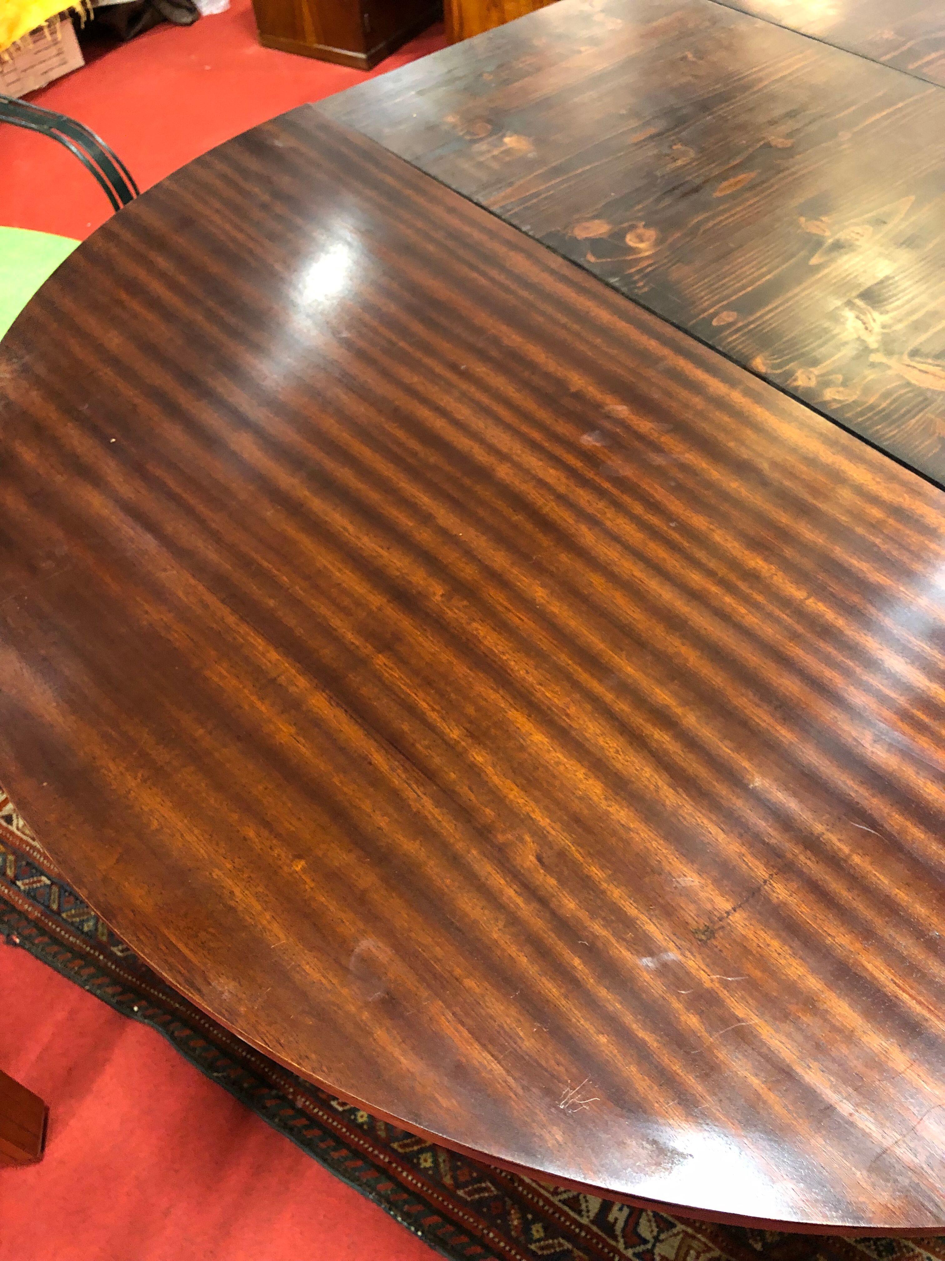Half-moon table with extensions