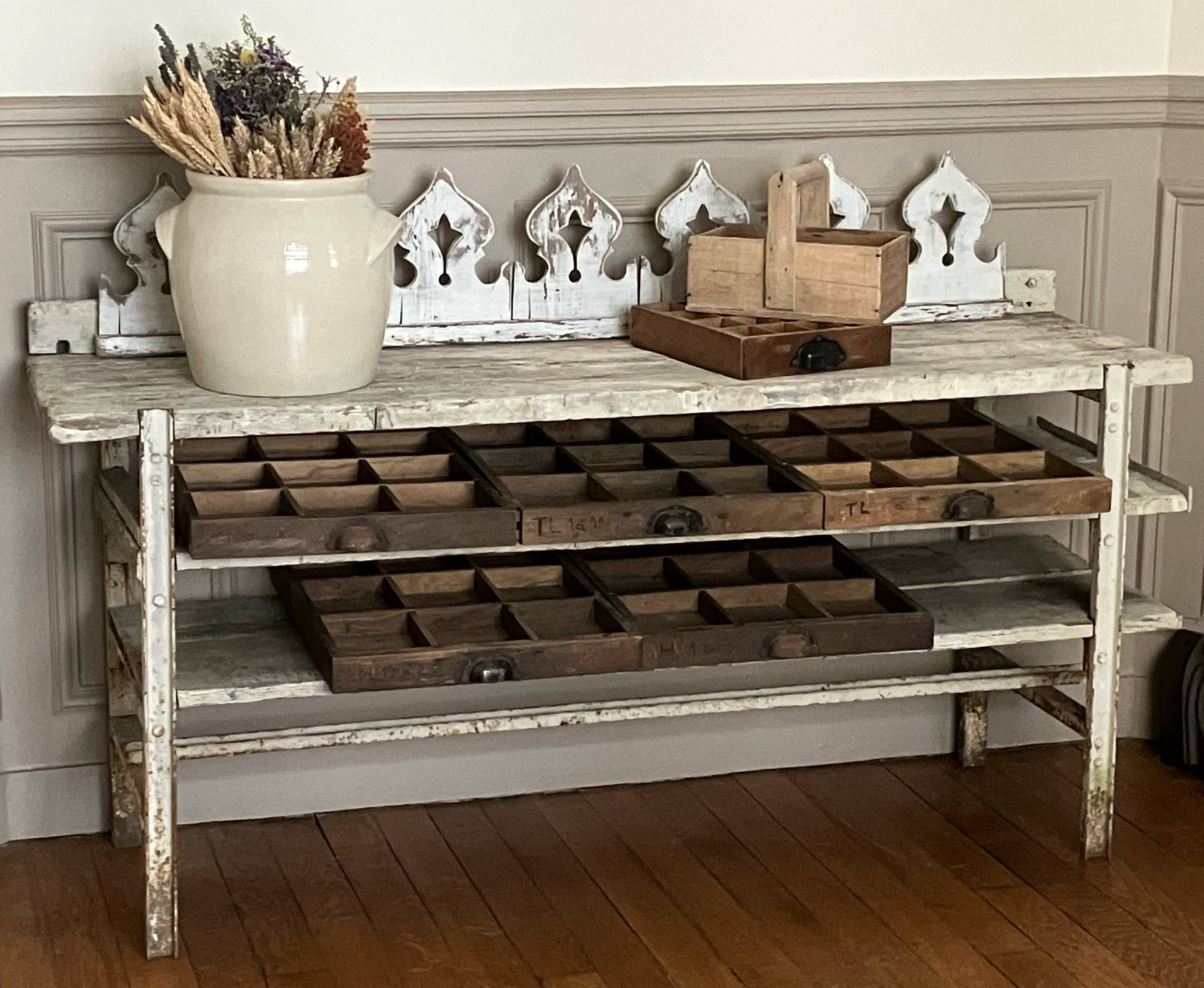 Old workbench, a piece of wooden and metal furniture.