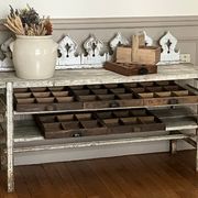 Old workbench, a piece of wooden and metal furniture.