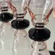 6 small Art Deco pink glasses with black stems, 7 cl.