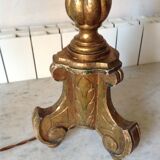 Old chandelier in gilded wood