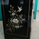 Buffet of black and gold laqué Chinese storage with relief subjects decorated flowers painted birds