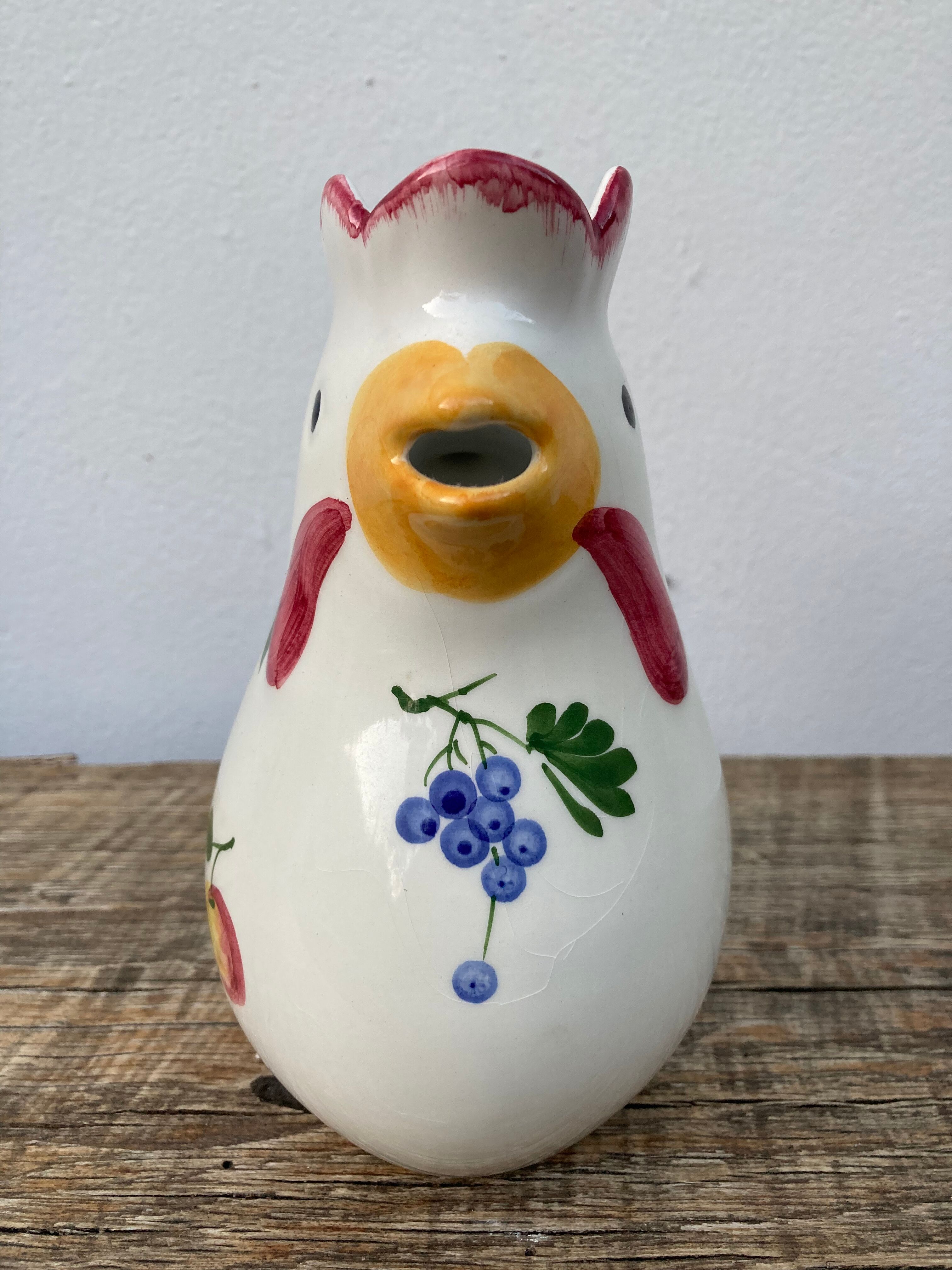 Ceramic rooster pitcher decorated with vintage flowers
