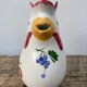 Ceramic rooster pitcher decorated with vintage flowers