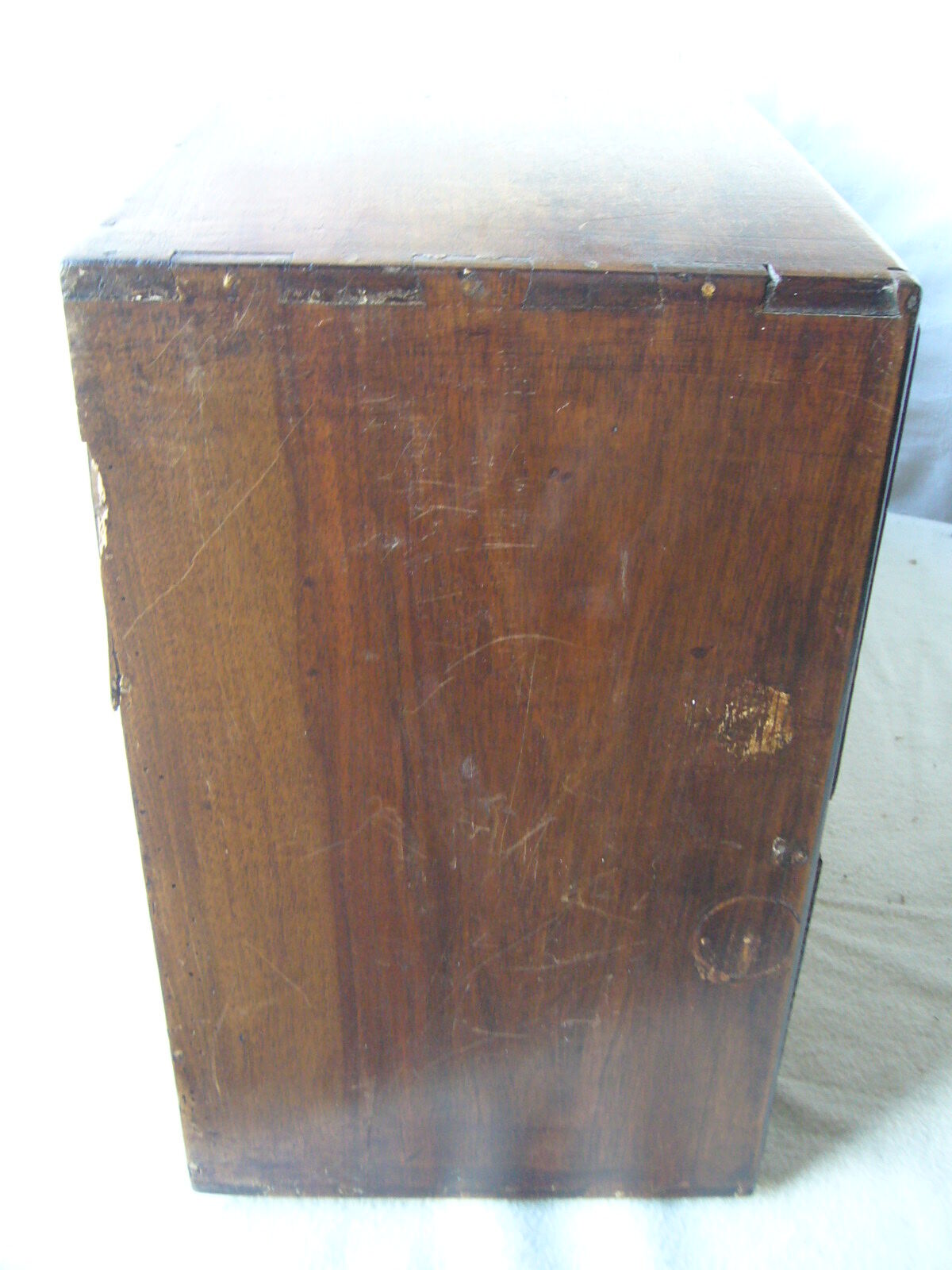 Antique, artisanal seven-drawer furniture