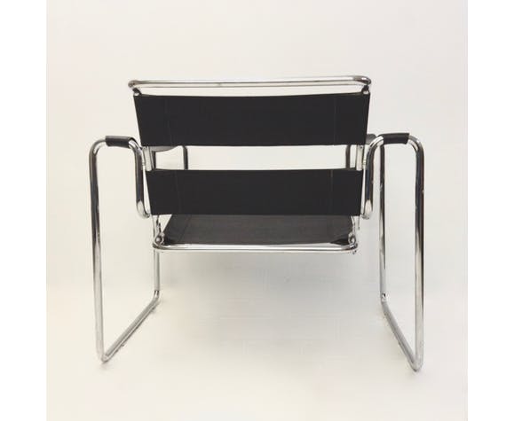 Fauteuil tubulaire et cuir noir