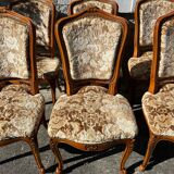 8 cherry wood chairs in Louis XV style with velvet upholstery.