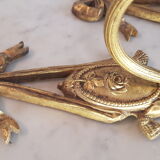Paire d'appliques murales en bronze