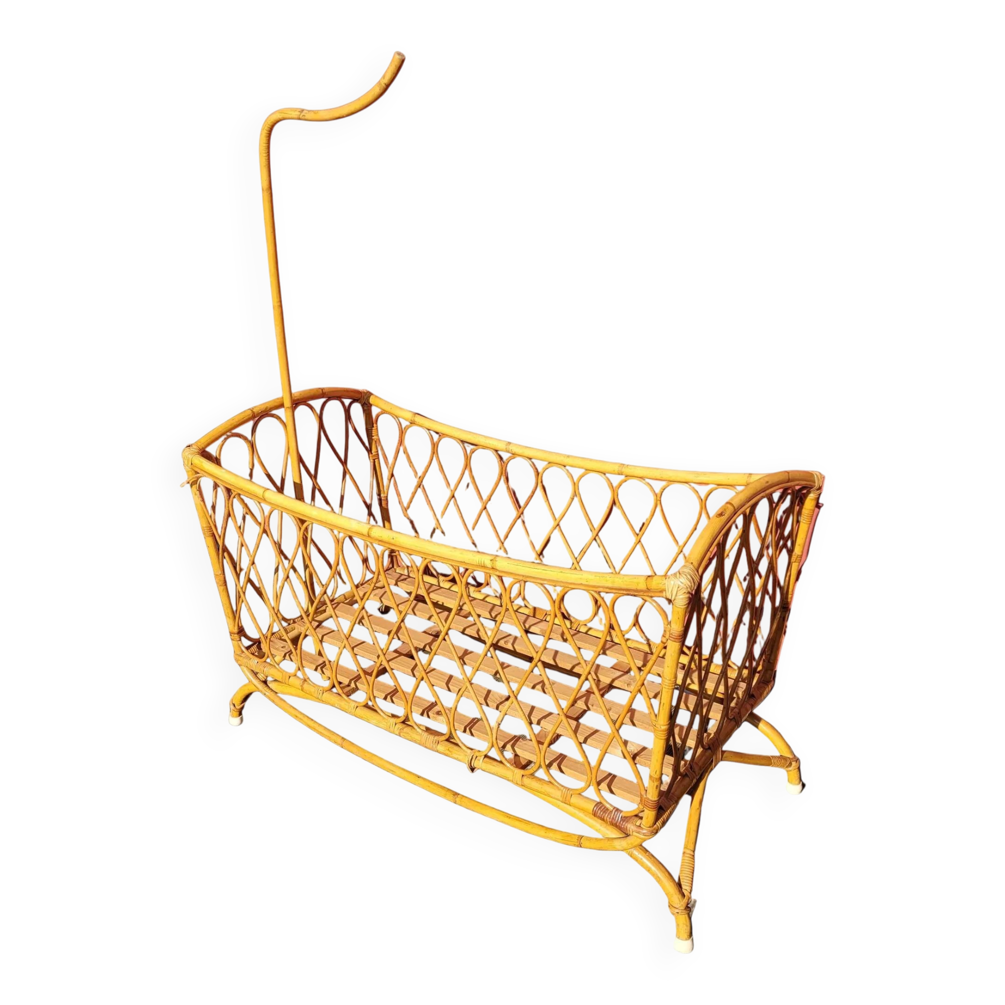 Bamboo and rattan baby cot with canopy.