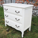 Old chest of drawers in white wood