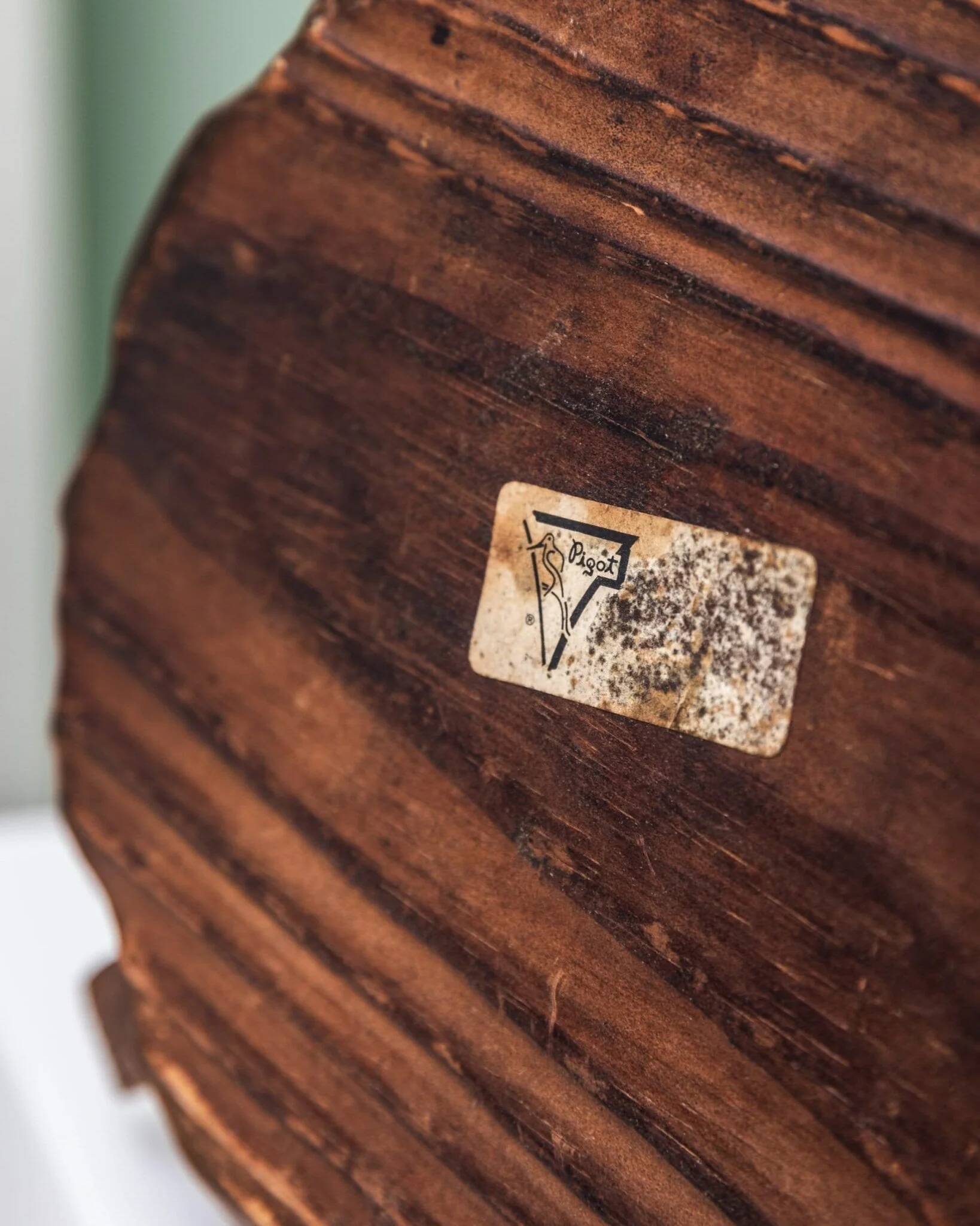 Brutalist carved wood candle holder, dark brown with lighter highlights, made in Italy, 1940s