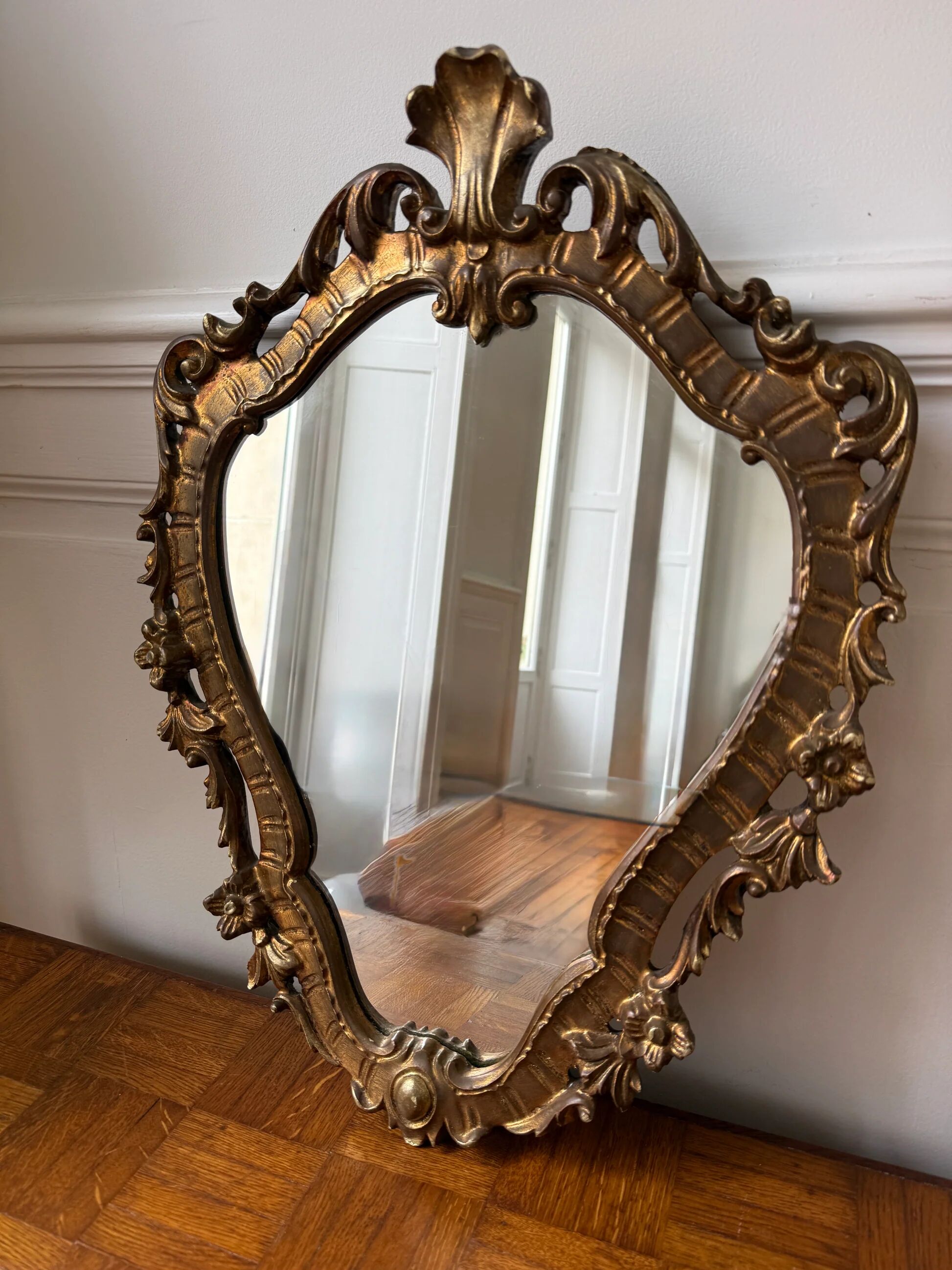 Golden rococo wall mirror