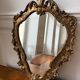 Golden rococo wall mirror