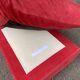 Grand pouf en velours bordeaux
