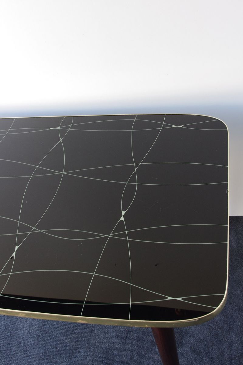 Folding table with black and gold painted glass, 1950