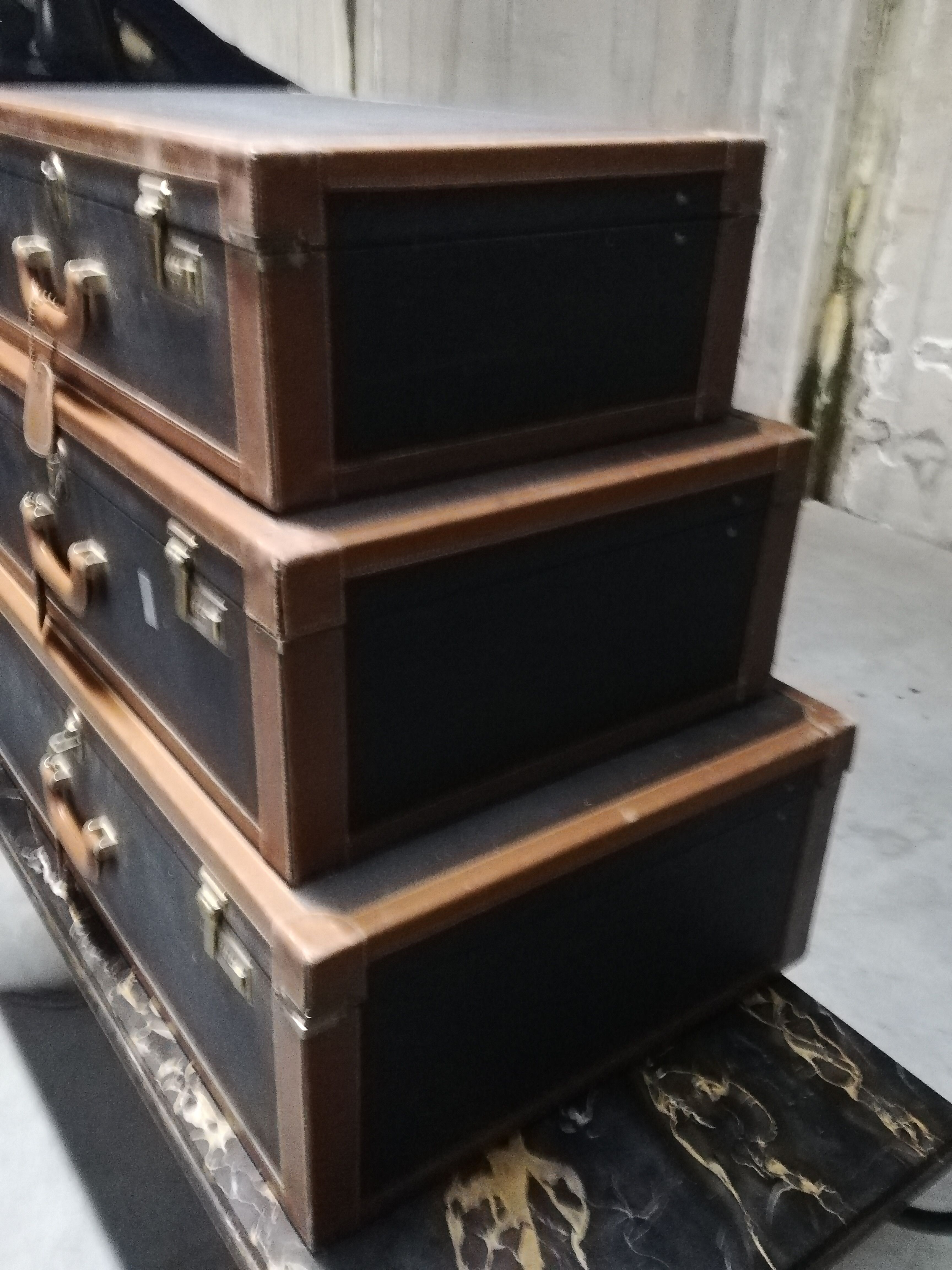 Pull-out leather and moleskine suitcases 1960