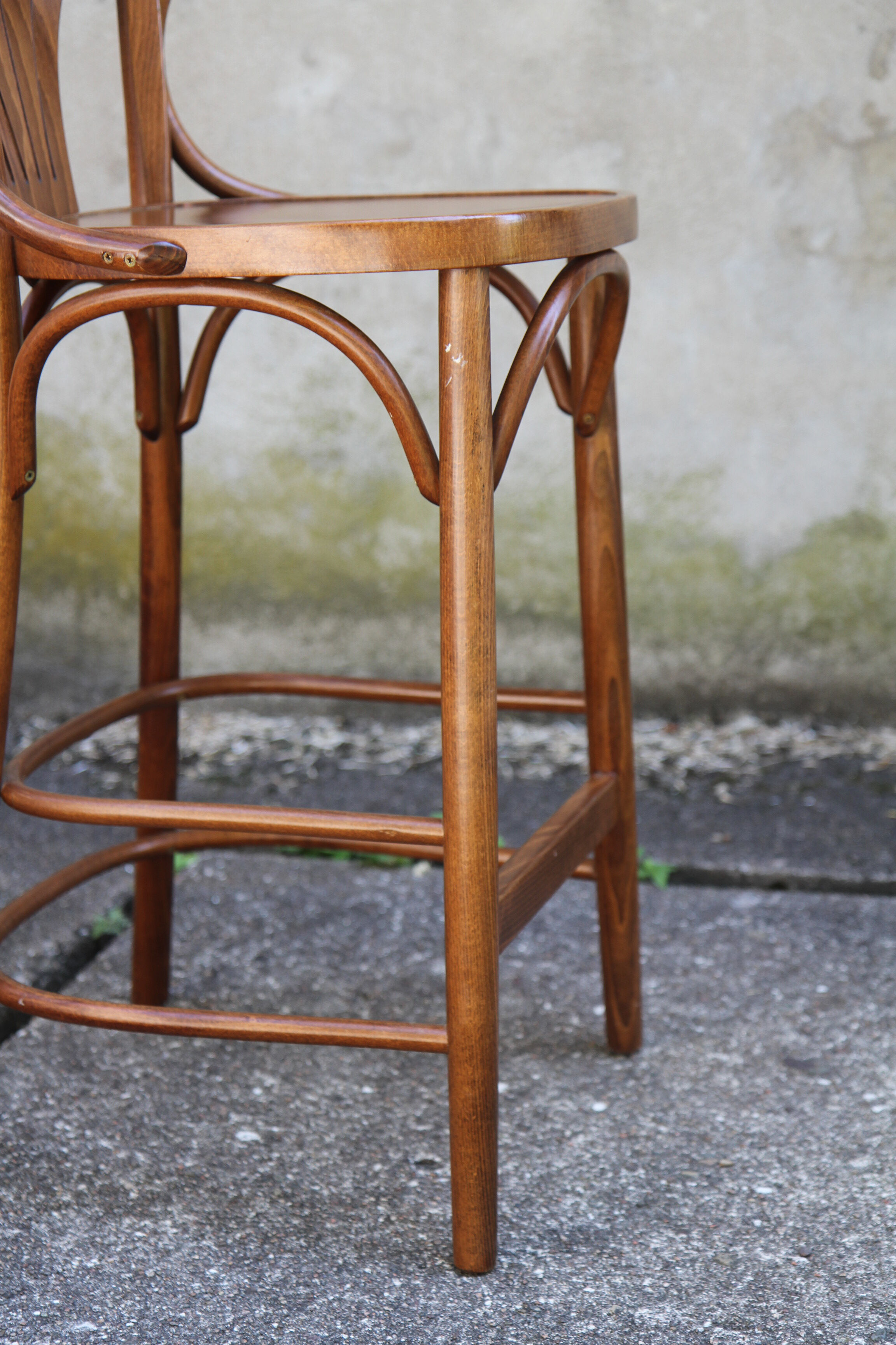 High curved wooden bar chair