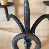 Wrought iron wall lights.