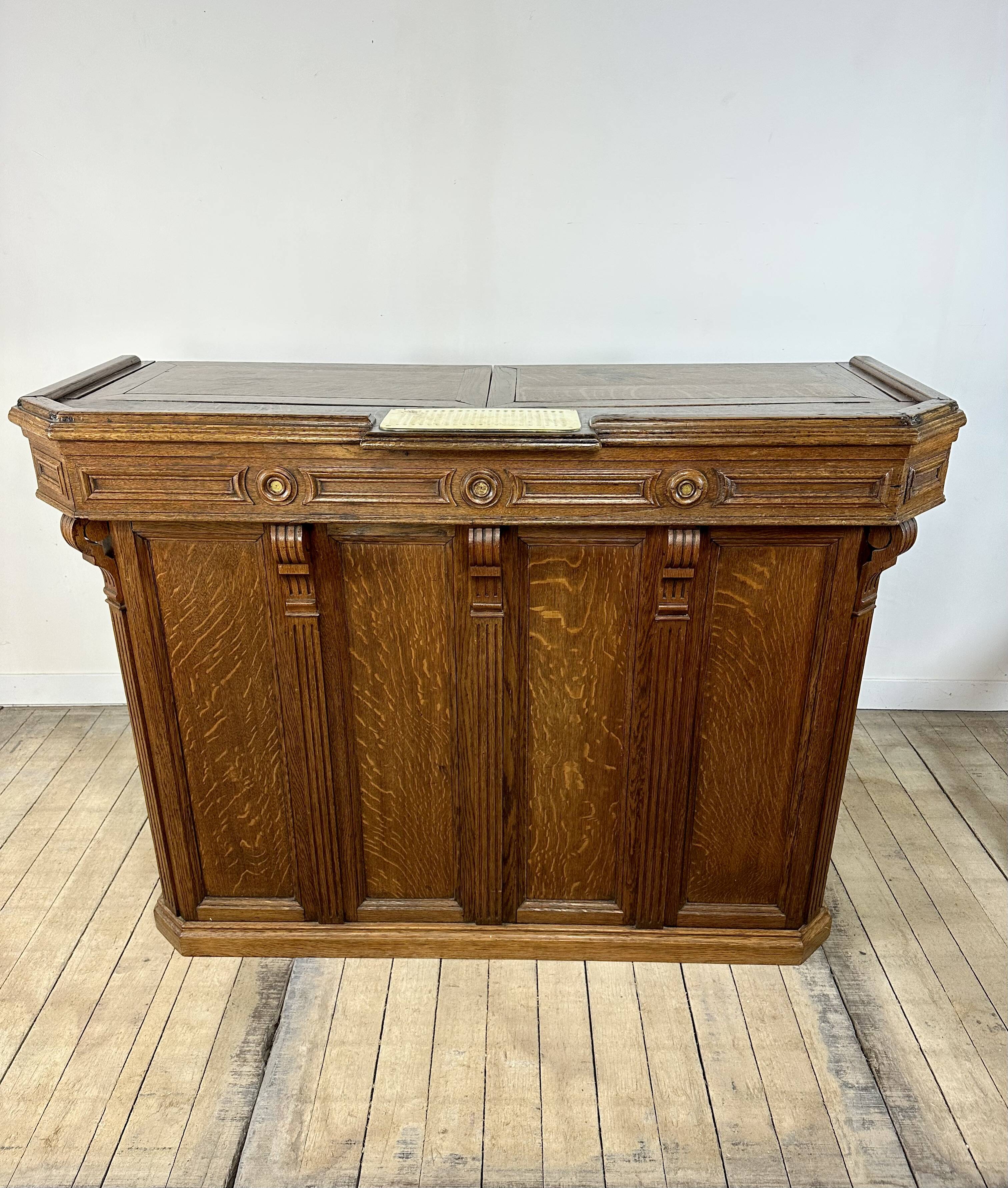 Solid oak reception counter from the late 19th century.