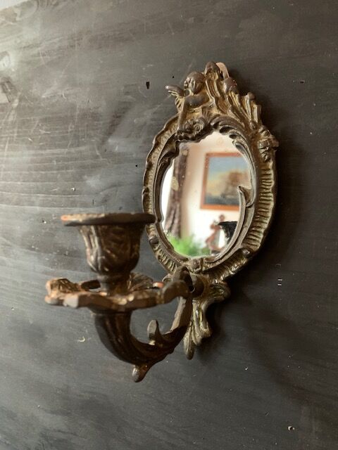 Pair of antique bronze candle holders