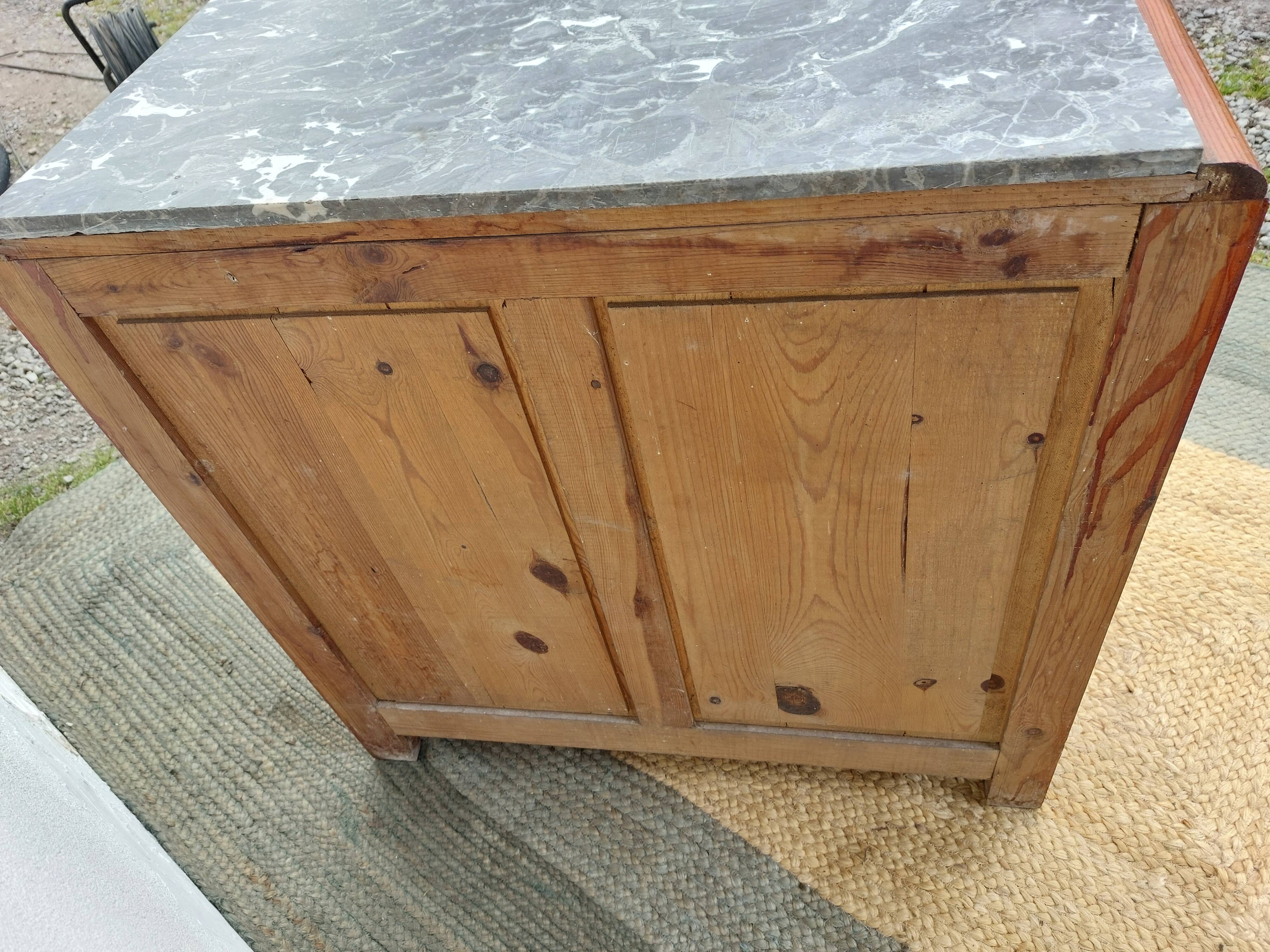 Mado buffet, marble top and asymmetrical doors.