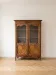 Vitrine en bois de merisier de style Régence