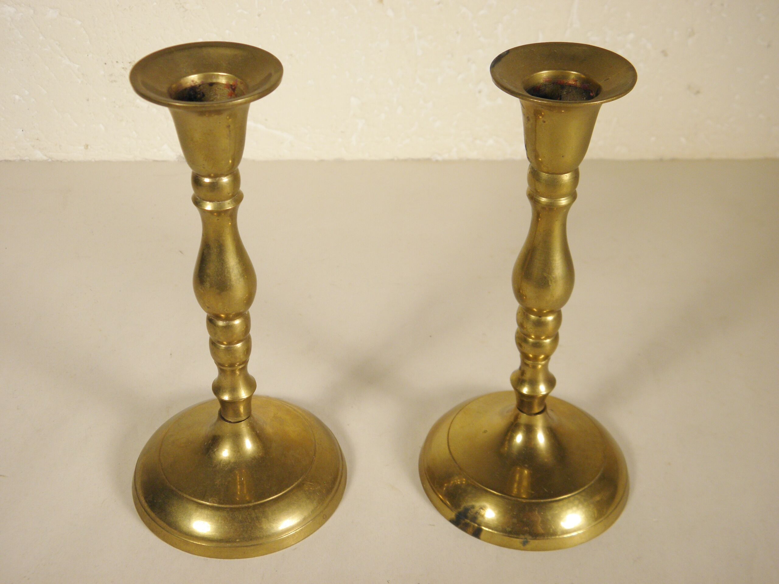 Pair of brass candle holders