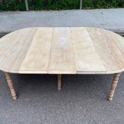 Renovated Louis Philippe round extendable dining table with flaps and 3 extensions.