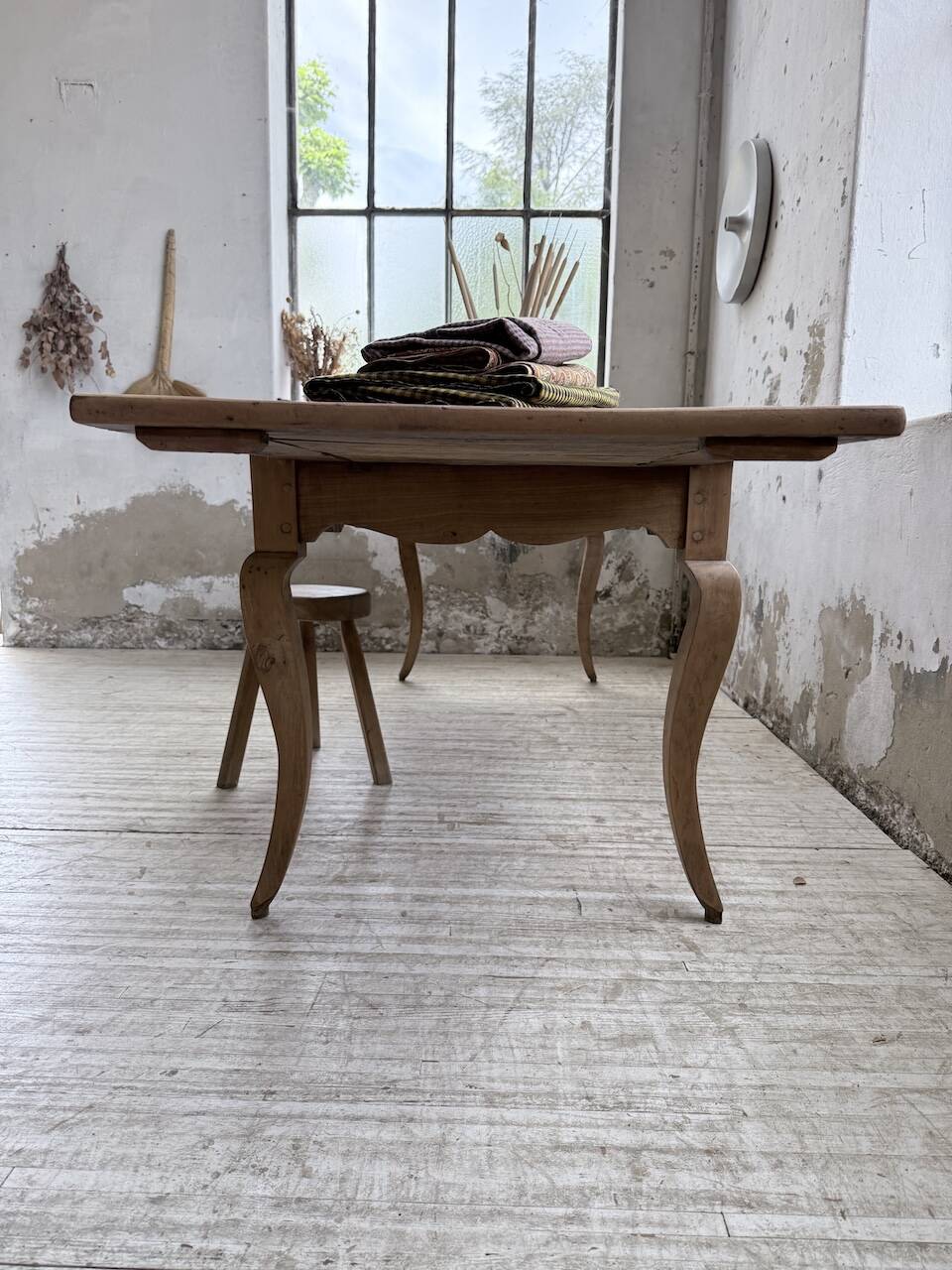 Farm table cherry wood with curved legs, 19th century.