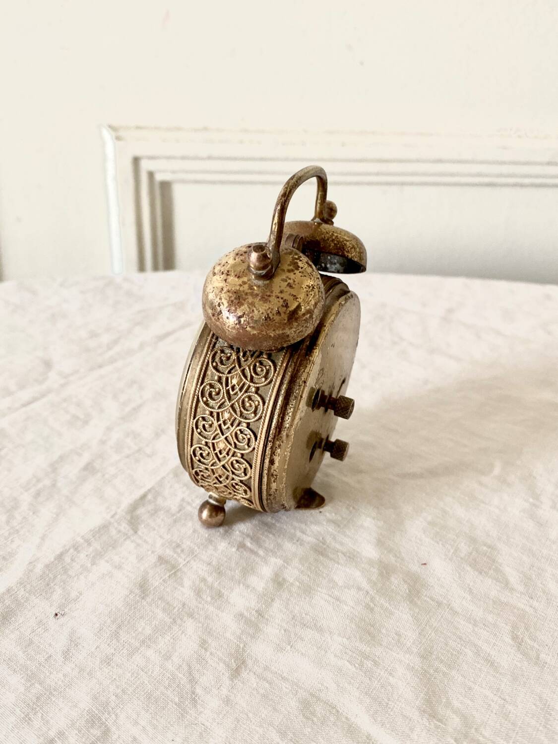 Small alarm clock old vintage watch in copper brass