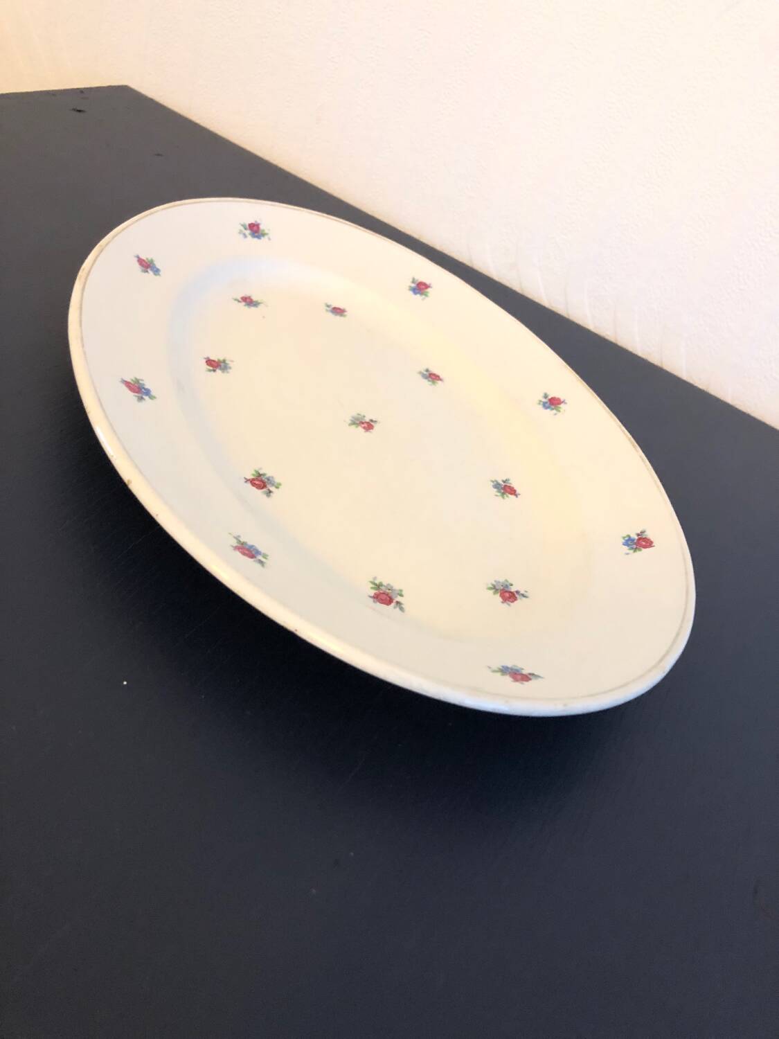 Vintage oval dish in Luneville earthenware with flower patterns
