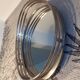 Oval wall mirror in chrome metal