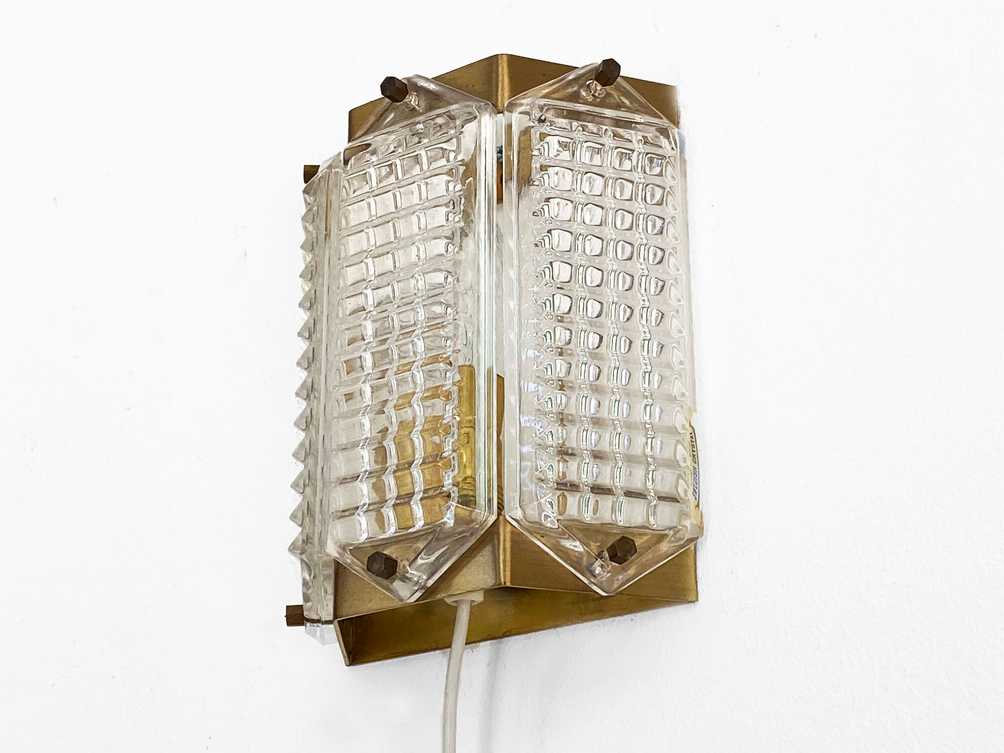 Brass and glass wall light/Sconce by Wiktor Berndt for Flygsfors. Sweden 1960s