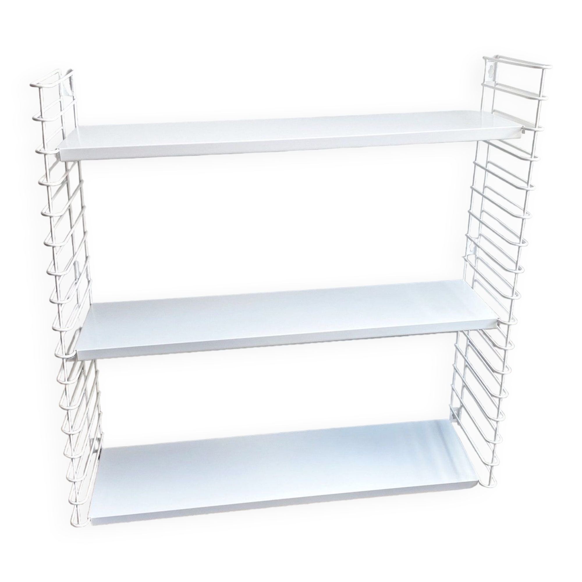 Tomado wall shelves designed by D. Dekker for TOMADO