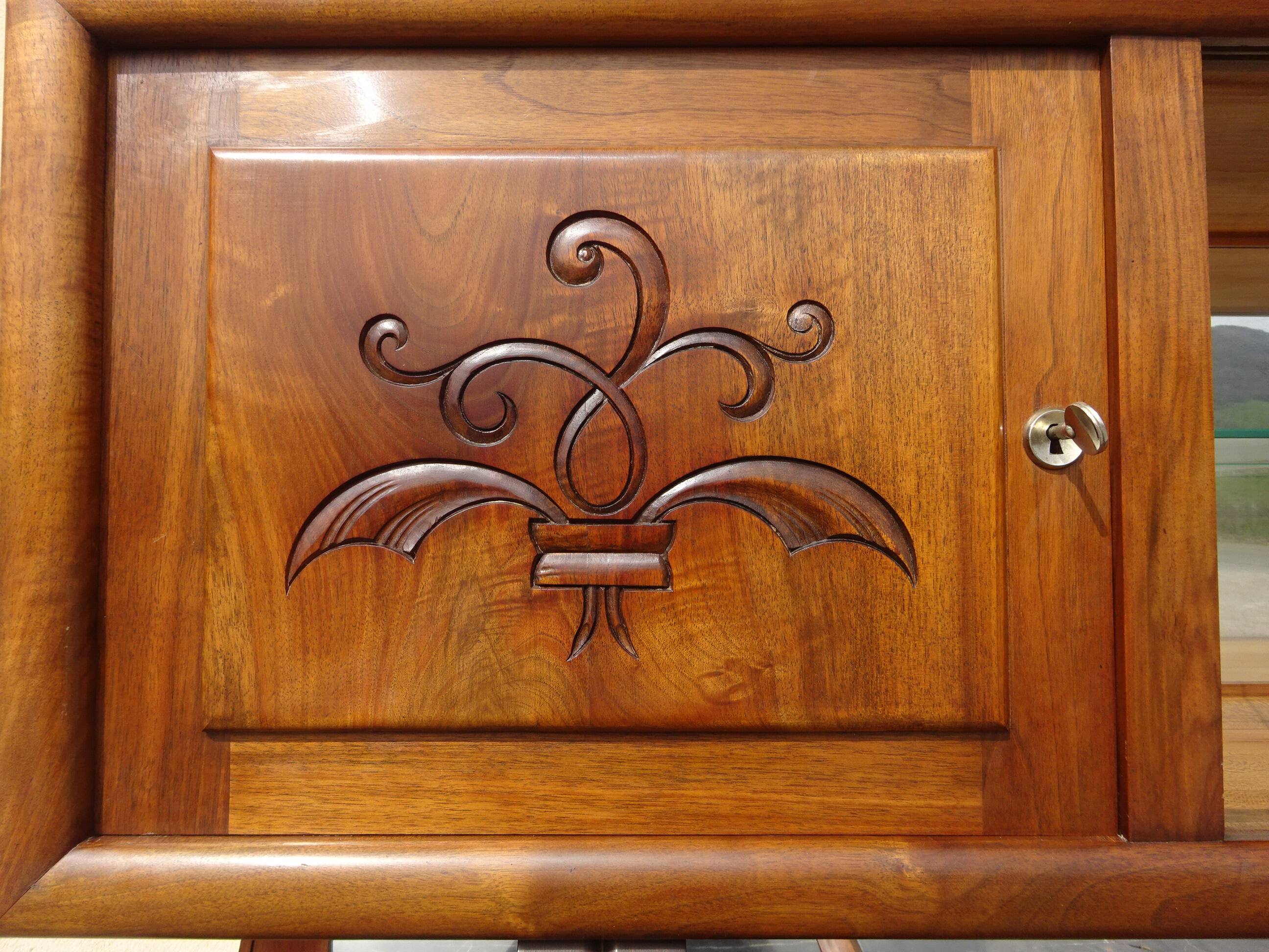 Solid walnut sideboard, moustache legs, black marble top.