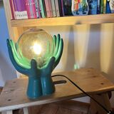 Green hands ceramic lamp