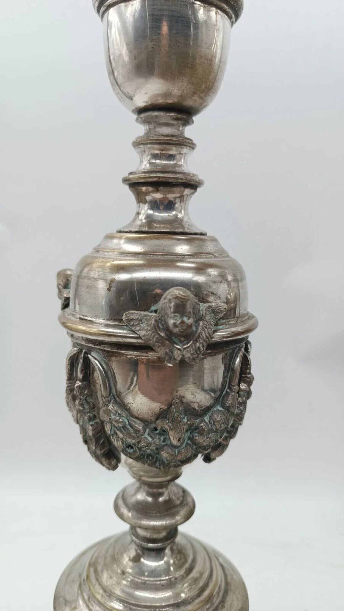 Pair of silver-plated bronze candlesticks in the Empire style, early 19th century, height 70 cm