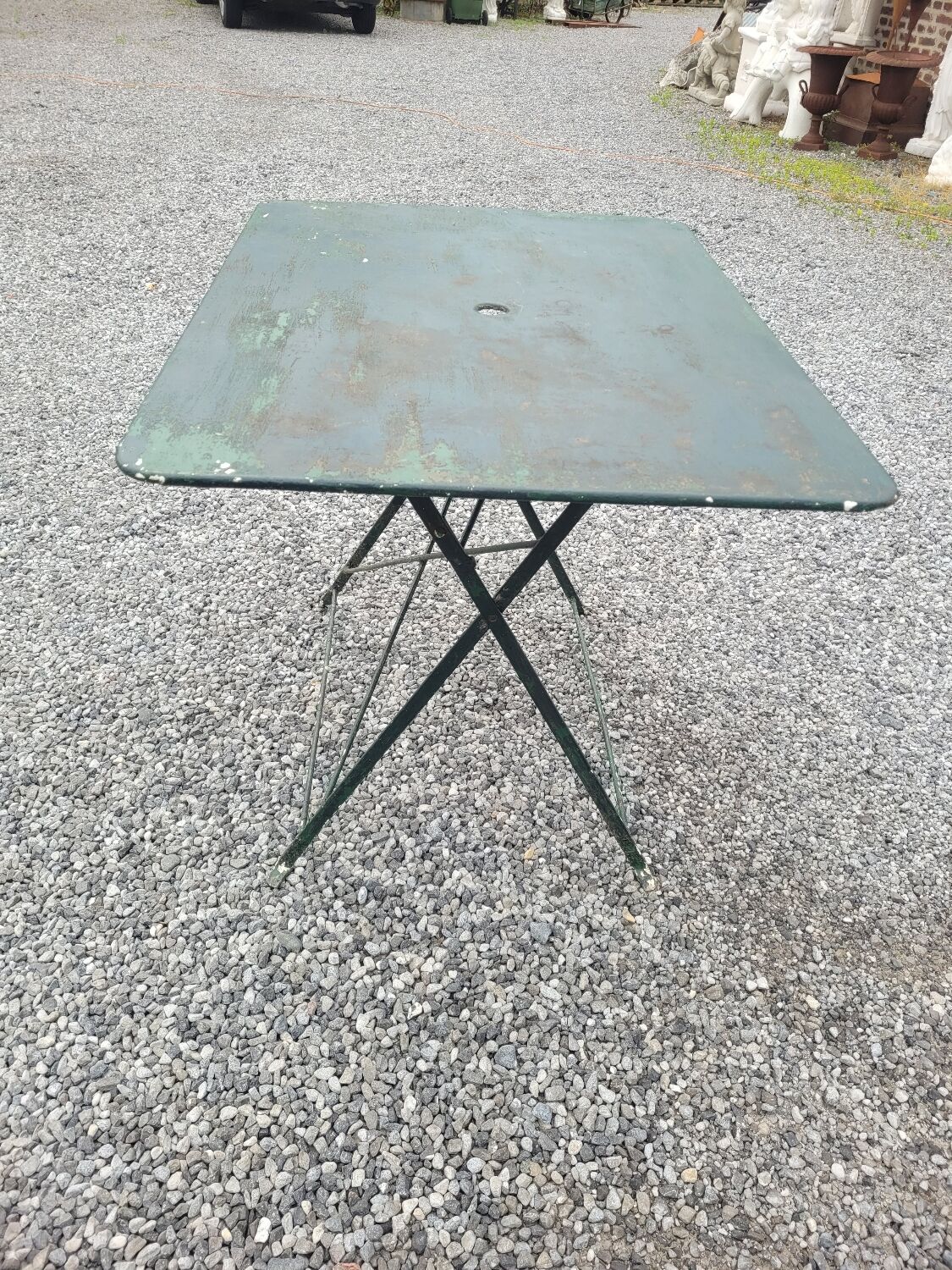 Old folding iron garden table