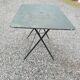 Old folding iron garden table