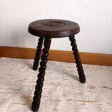 Brutalist tripod stool with twisted legs